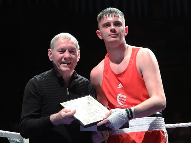 Derry Boxing legend Charlie Nash makes a presentation to winner, Tiarnan Mayse, who defeated Peter Clarke in the 75kg special event bout. (Photo - Tom Heaney, nwpresspics)