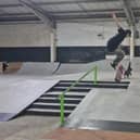 Joe performing tricks in his skatepark.