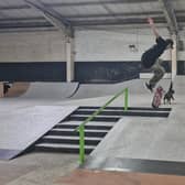 Joe performing tricks in his skatepark.