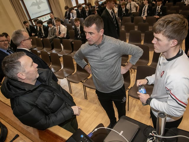 Oisin McConville, former Armagh GAA pictured in conversation with Mr. Eamonn Burns, Head of PE, and Oran O'Kane, GAA Participation Officer, during last week's visit to St. Columb's College.