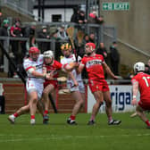 Tyrone and Derry players contest a loose sliothar during the league meeting between the counties. Photo: George Sweeney