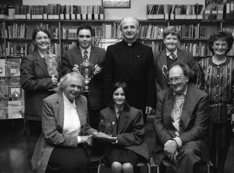 Dr. Vera Furness, guest speaker, at St. Mary's prize-giving, presenting the Environmental Award to Terri Ann Moore.