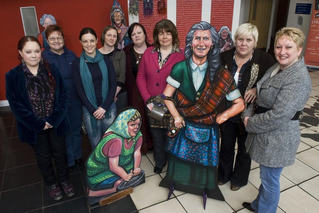 Councillor Patricia Logue, third from right, representing the Mayor, pictured with members of the Eden Place Arts Centre at the exhibition of their work "Women's Real Lives" part of International Women's Day in The Verbal Arts Centre on Friday. Included are, from left, Aine Croston, Judy Logue, Claire McDermott, Beryl Stewart, Andrea Redmond, Susan Gill and Sharon Daly. LS11-162KM