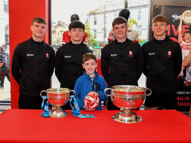 Jack McGrath pictured with members of Derry's All-Ireland Minor Champions team at O'Neill's Superstore last week. Photo: George Sweeney
