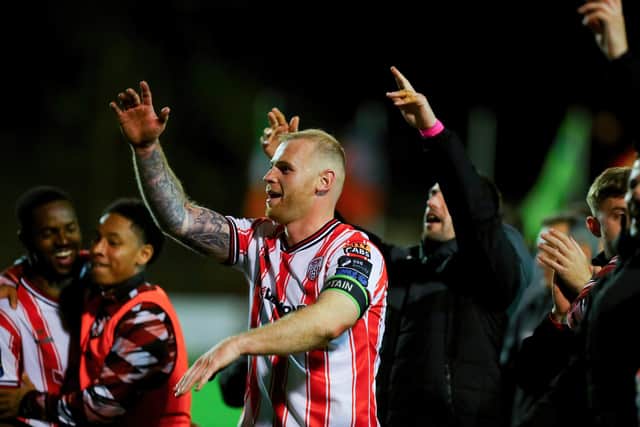 Mark Connolly leads the celebrations down at Dalymount.