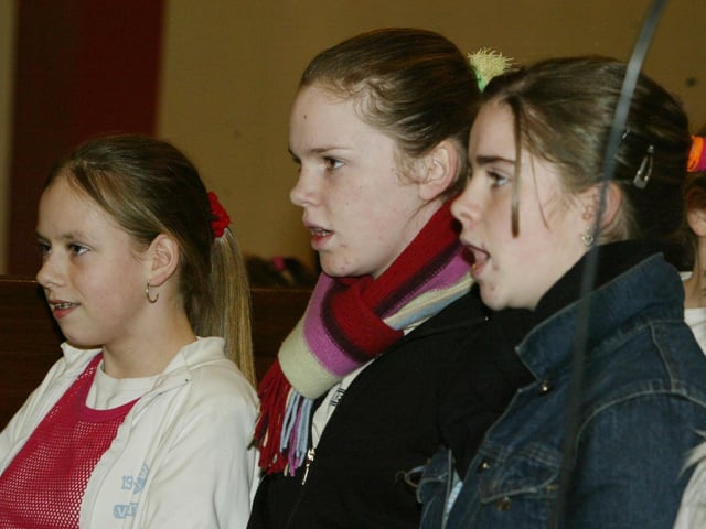 Senior member of the Childrens Choir performing at the Children in Crossfire carol service.  (1612JB93):Derry nativities and Christmas shows from December 2003
