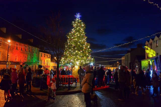 The colourful Christmas tree lights were switched on in Moville last year. Photo: George Sweeney.  DER2148GS – 001