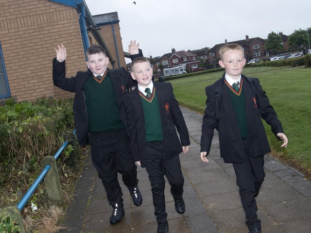 Some of the new Year 8 intake at St. Joseph's Boys School make their way to school on Monday morning. From left, Aaron Kellyk Jack O''Hagan and Shea McDaid. : St. Joseph's Boys School welcomes latest influx of Year 8 pupils