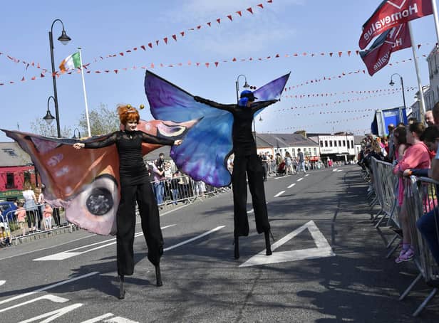 These stilt walkers entertained the crowd as they waited to watch the Easter Parade in Carndonagh in 2019 DER1719-161KM