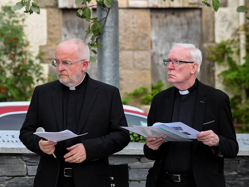 The Rev. David Slater, Church of Ireland, and Fr. David O’Kane, PP, VF, led a service in Claudy marking the 52nd anniversary of the car bombings that killed nine people and injured 30 others. Photo: George Sweeney
