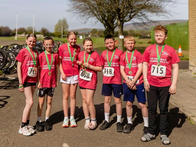 Medal time at the Caina Healey Children's Try-a-Tri, a special event organised by the Bogside and Brandywell Health Forum in partnership with the Danny Quigley Fund.