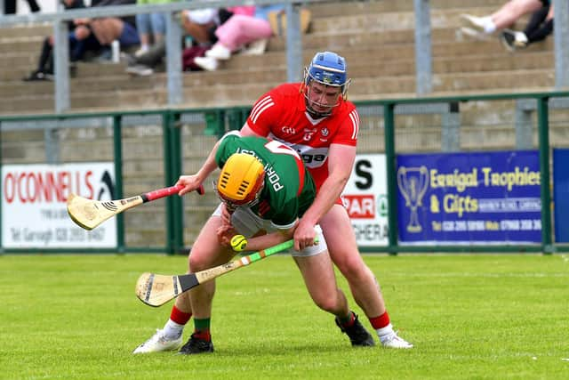 Derry's Sean Kelly battles with Mayo's Conor Murray during the Christy Ring Cup game in Owenbeg. (Photo: George Sweeney}