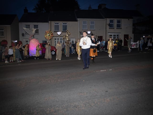 The Mayor, Ruairí McHugh leads the procession on Friday night. (Photos: Jim McCafferty Photography) : .
