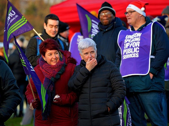 Health and care workers from NIPSA, UNISON and GMB trade unions, campaigning for fair pay and conditions, take part in industrial action at Altnagelvin Hospital on Monday morning. Photo: George Sweeney. DER2250GS – 07