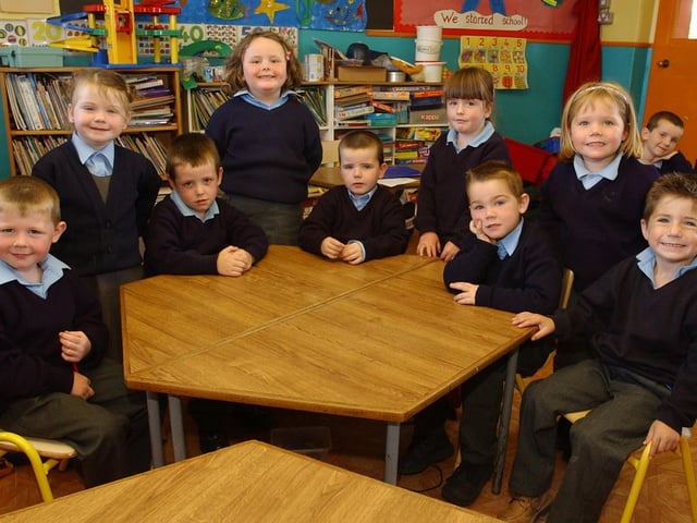 Junior Infants from Craigtown National School. Included, seated from left, Nicholas Harkin, Darraigh McGuinness, PJ Walker, Patrick Callaghan, and Kevin Doherty. Standing, from left, Ciara Gillen, Niamh Moyne, Caoimhe McWilliams, and Caitlin Canny. (1209PG03):20 years on: Young people across Derry and Donegal starting school in September 2003