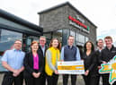 Pictured at EUROSPAR Skeoge are James Kelly, Danielle Johnston, Gregory Nicholl, Alex Murdock from Cancer Fund for Children, Conor Lynch Store Owner, Denise Ferguson, Alastair O’Connor and John Bradley.
