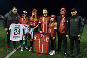 Derry City and Dundalk FC present club jerseys to the family of the late Private Sean Rooney, who was killed in Beirut on 14th December last, before Friday evening’s  game. From left to right are Derry City manager Ruaidhri Higgins, Natasha Rooney McCloskey, Holly McConnellogue, Paul McCloskey ,Robyn McCloskey, Callum McCloskey and Dundalk FC manager Stephen O’Donnell.  Photo: George Sweeney. DER2310GS – 061