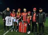 Derry City and Dundalk FC present club jerseys to the family of the late Private Sean Rooney, who was killed in Beirut on 14th December last, before Friday evening’s  game. From left to right are Derry City manager Ruaidhri Higgins, Natasha Rooney McCloskey, Holly McConnellogue, Paul McCloskey ,Robyn McCloskey, Callum McCloskey and Dundalk FC manager Stephen O’Donnell.  Photo: George Sweeney. DER2310GS – 061