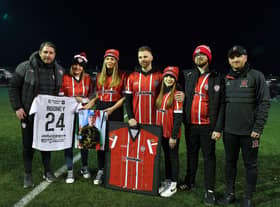 Derry City and Dundalk FC present club jerseys to the family of the late Private Sean Rooney, who was killed in Beirut on 14th December last, before Friday evening’s  game. From left to right are Derry City manager Ruaidhri Higgins, Natasha Rooney McCloskey, Holly McConnellogue, Paul McCloskey ,Robyn McCloskey, Callum McCloskey and Dundalk FC manager Stephen O’Donnell.  Photo: George Sweeney. DER2310GS – 061