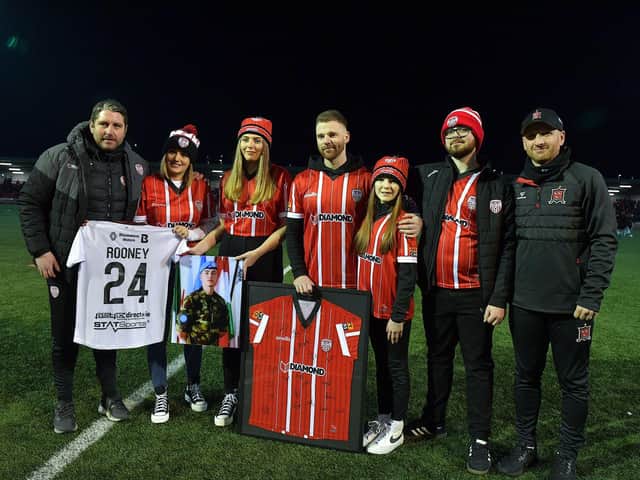 Derry City and Dundalk FC present club jerseys to the family of the late Private Sean Rooney, who was killed in Beirut on 14th December last, before Friday evening’s game. From left to right are Derry City manager Ruaidhri Higgins, Natasha Rooney McCloskey, Holly McConnellogue, Paul McCloskey ,Robyn McCloskey, Callum McCloskey and Dundalk FC manager Stephen O’Donnell. Photo: George Sweeney. DER2310GS – 061