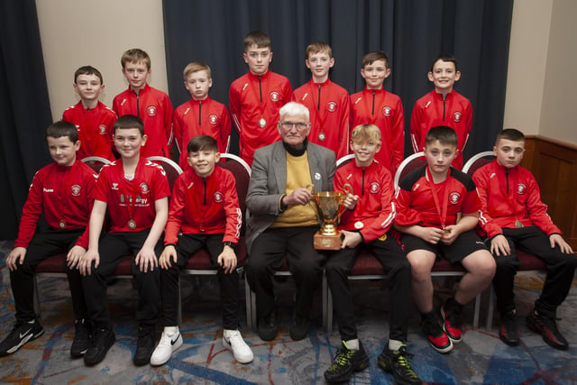 John ‘Jobby’ Crossan pictured with the Tristar U11 team, winners of the D&D Kieran Coyle Cup, during the Annual Awards in the City Hotel on Friday night last.