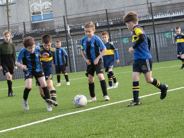 A midfield tussle between Oxford and Don Boscos in the 2015 Sean O'Kane Cup clash on Sunday. (Photo: Jim McCafferty)