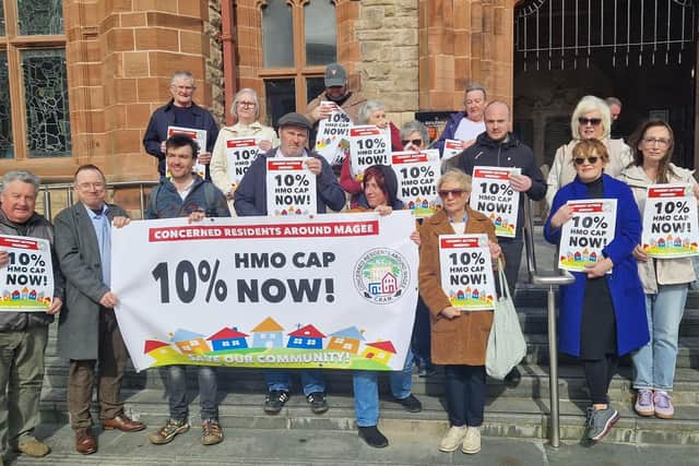 Residents staged a protest outside the Guildhall ahead of the meeting. Photo: Jack Tibbetts.