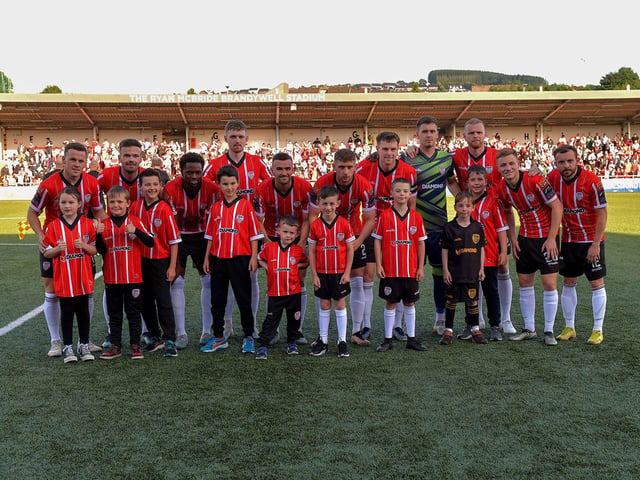 Mascots pictured with the Derry City starting eleven against Sligo Rovers at the Brandywell on Friday evening. Photo: George Sweeney. DER2327GS - 083