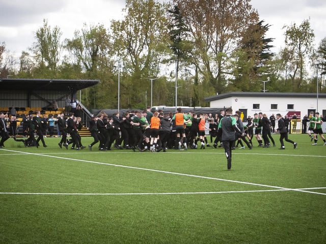 PITCH INVASION CELEBRATION. . . . The massive St. Joseph’s support take to the pitch to celebrate at the final whistle on Friday.