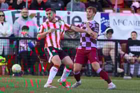 Michael Duffy holds off his man during the first half against Drogheda United. Photograph by Kevin Moore.