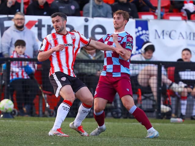 Michael Duffy holds off his man during the first half against Drogheda United. Photograph by Kevin Moore.