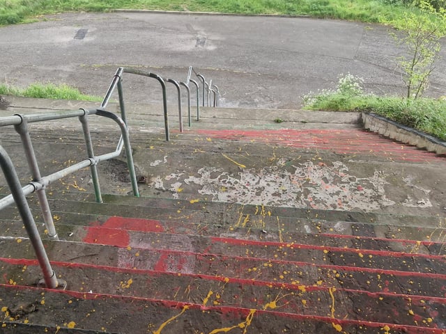 A slogan at the foot of the steps declaiming ‘if you don't like GRAFFITI look away like you do for GENOCIDE’ was partly concealed with the word ‘GENOCIDE’ partly erased by the vandals.