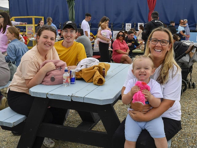 People enjoy the atmosphere at the Family Fun Day at Fahan Marina on Sunday afternoon. Photo: George Sweeney