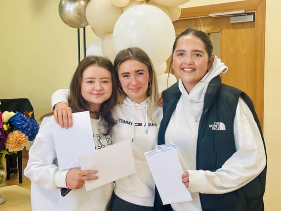 Friends Emma Meehan, Clodagh Curran and Chloe Mc Ginley celebrate their GCSE outcomes.