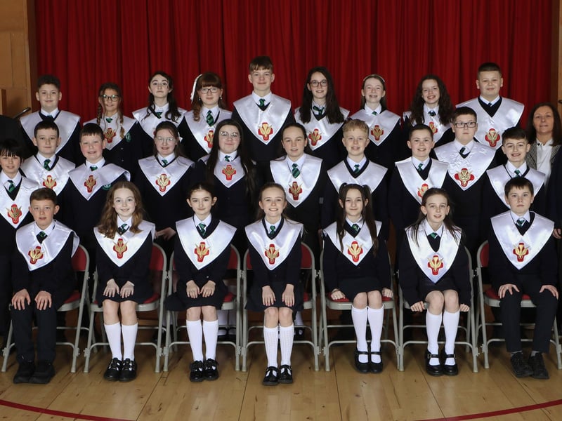 Pupils from St. Patrick’s Primary School who were confirmed by Bishop Donal McKeown in St. Patrick’s Church, Pennyburn. Included are Mr. J. Bradley, teacher and on right Scarlett Kearns, student and Annamarie Boyle, classroom assistant. (Photo - Tom Heaney, nwpresspics)