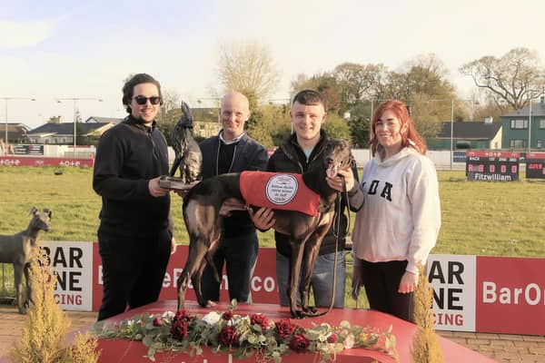 Spencer Saberton (left), Lifford Racing Manager, presents William Mullan with a trophy in recognition of his achievement in training 1,000 winners. Beside Mr Mullan is his nephew, Tom Mullan, and Janine Barber. (Photo by John Killen)