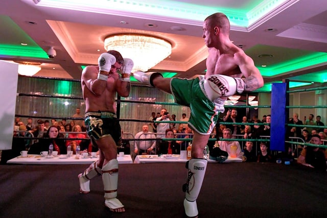 Rathmor Warriors’ Jake Mooney (right) defeated Dennis Lafferty, SMAA,  to win the Lightweight LK Irish Title, on Saturday evening last, in the Everglades Hotel. Photo: George Sweeney.  DER2312GS – 69