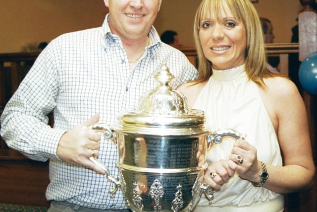 The FAI Cup made a surprise appearance at Kevin Gallagher's 40th birthday celebrations in the PO Club. Kevin is pictured with his wife Paula. 191202HG73:2003 Party Pics
