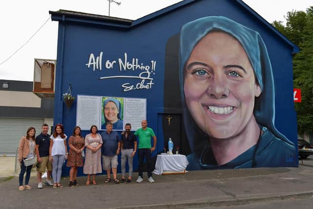 Family and friends of Sister Clare Crockett pictured at the a mural dedicated to her memory , officially unveiled in Deanery Street. DER2034GS - 009