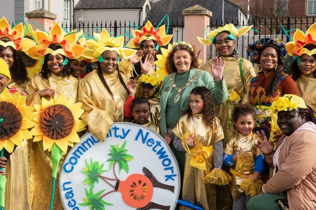 Smiling faces with Mayor Patricia Logue on St. Patrick's Day in Derry