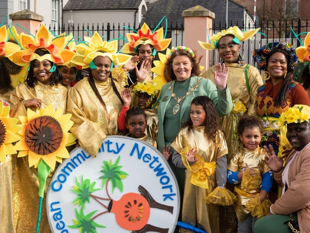 Smiling faces with Mayor Patricia Logue on St. Patrick's Day in Derry