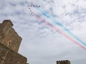 The Red Arrows fly over Carrickfergus Castle in 2021. Picture by Matt Mackey / Press Eye.