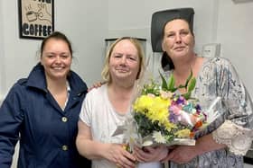 Kathleen Tracey (centre) was presented with a bouquet of flowers by Lisa McLaughlin (left) at the big Gala Night of Racing. Kathleen’s friend is on right of photo.