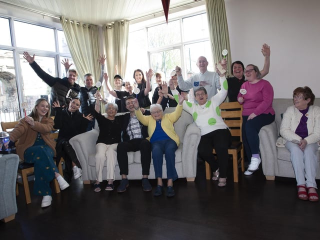 Residents and staff of Alexander House show their support for Damian McGinty on Tuesday morning when he and dance partner Kylee visited.