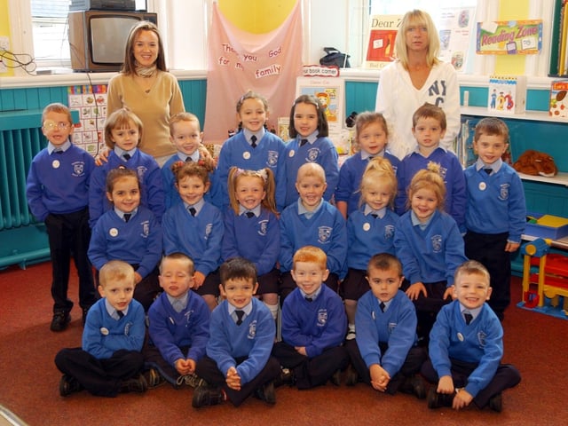 Primary 1 pupils from the nazareth House Primary School pictured with their teacher, Mrs Shauna Molloy O'Dowd and Miss Margaret Harkin, classroom assistant. (0310A100):20 years on: Young people across Derry and Donegal starting school in September 2003