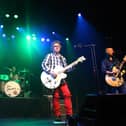Davy Carton (L) and Leo Moran of the band "The Saw Doctors" performing previously on stage at Irving Plaza in New York City.  (Photo by Neilson Barnard/Getty Images)