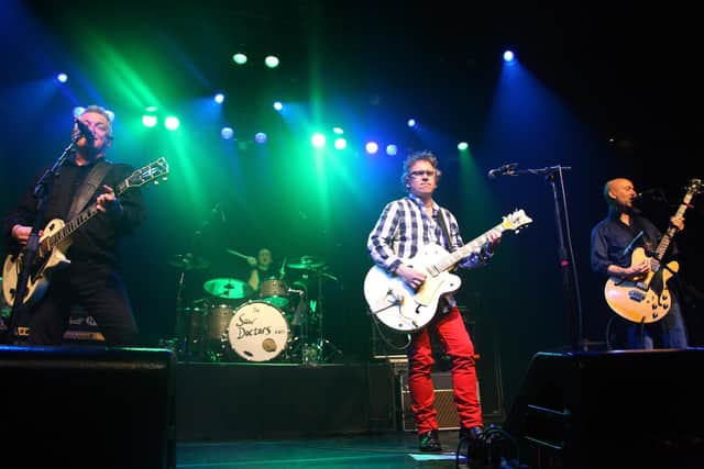 Davy Carton (L) and Leo Moran of the band "The Saw Doctors" performing previously on stage at Irving Plaza in New York City. (Photo by Neilson Barnard/Getty Images)