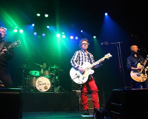 Davy Carton (L) and Leo Moran of the band "The Saw Doctors" performing previously on stage at Irving Plaza in New York City.  (Photo by Neilson Barnard/Getty Images)
