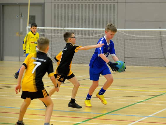 Rosemount in action against Glendermott in the Boys' Indoor City Football Championships played in the Foyle Arena. Photo: George Sweeney. DER2306GS  18