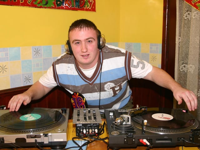 Birthday Boy Alex enjoying his new turntable set 2256/dd : Parties and celebrations January 2006: Alex Lynch.